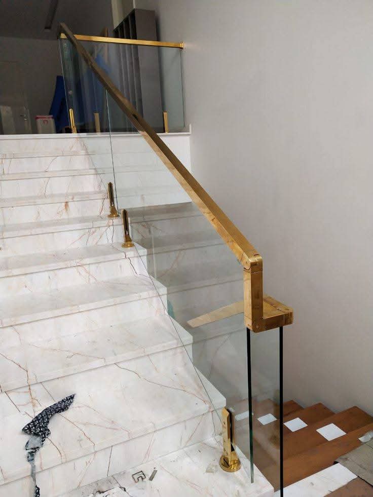 SKY Glass — brass glass railing on marble staircase Gurgaon